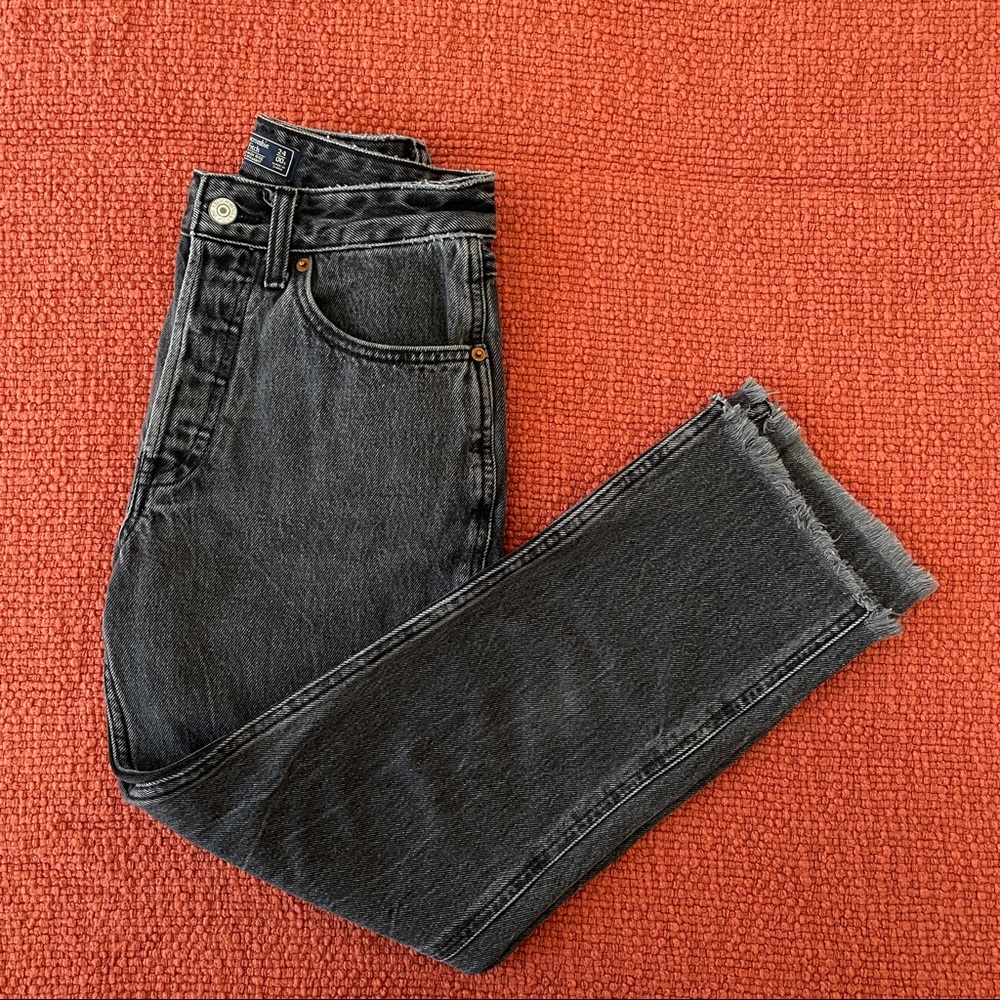 Faded black raw hem jeans